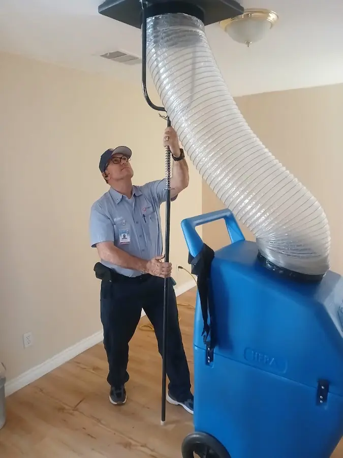 HVAC Installation technician using HEPA equipment in Dedham